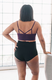 Back of black high-waisted maternity bloomers support wear